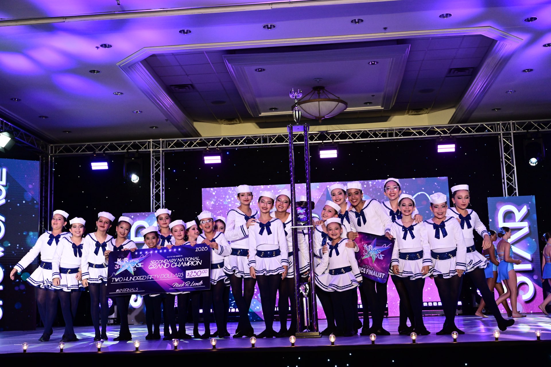 The Ascendance competitive team on stage