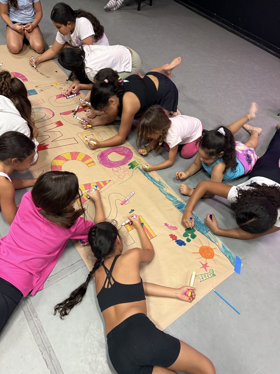 Campers dancing in an Ascendance summer studio